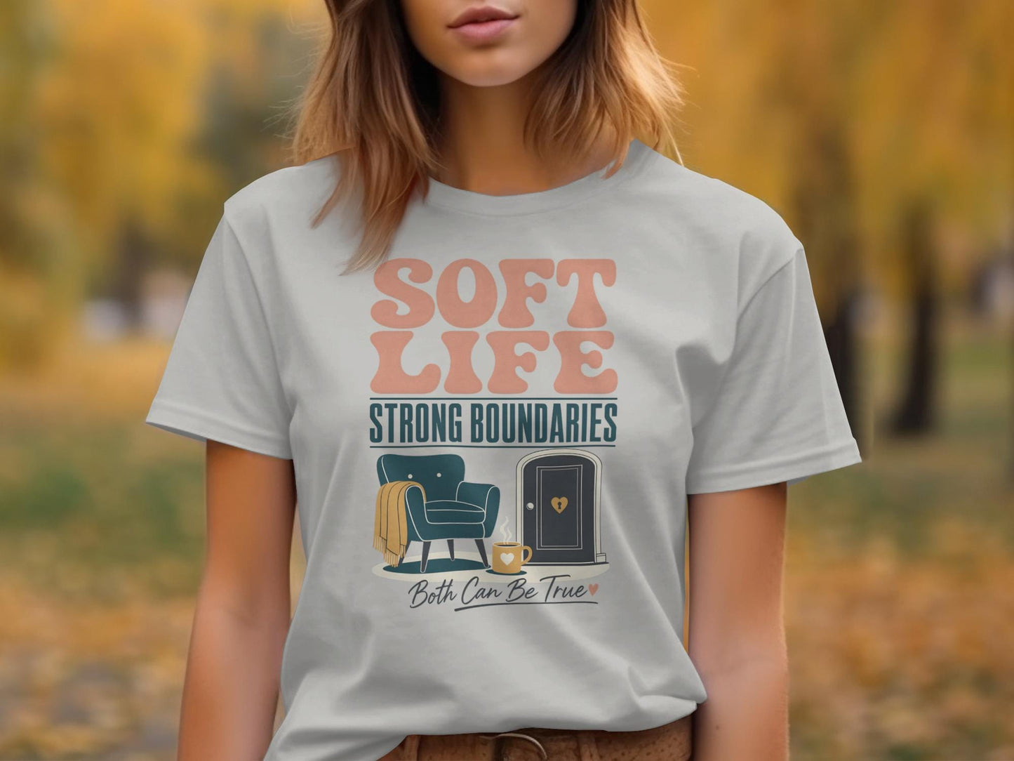 T-shirt graphic "Soft Life Strong Boundaries Both Can Be True" with armchair and door.