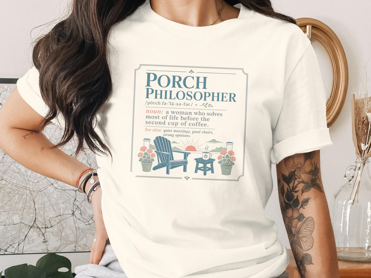 White t-shirt with "Porch Philosopher" definition and porch scene graphic.
