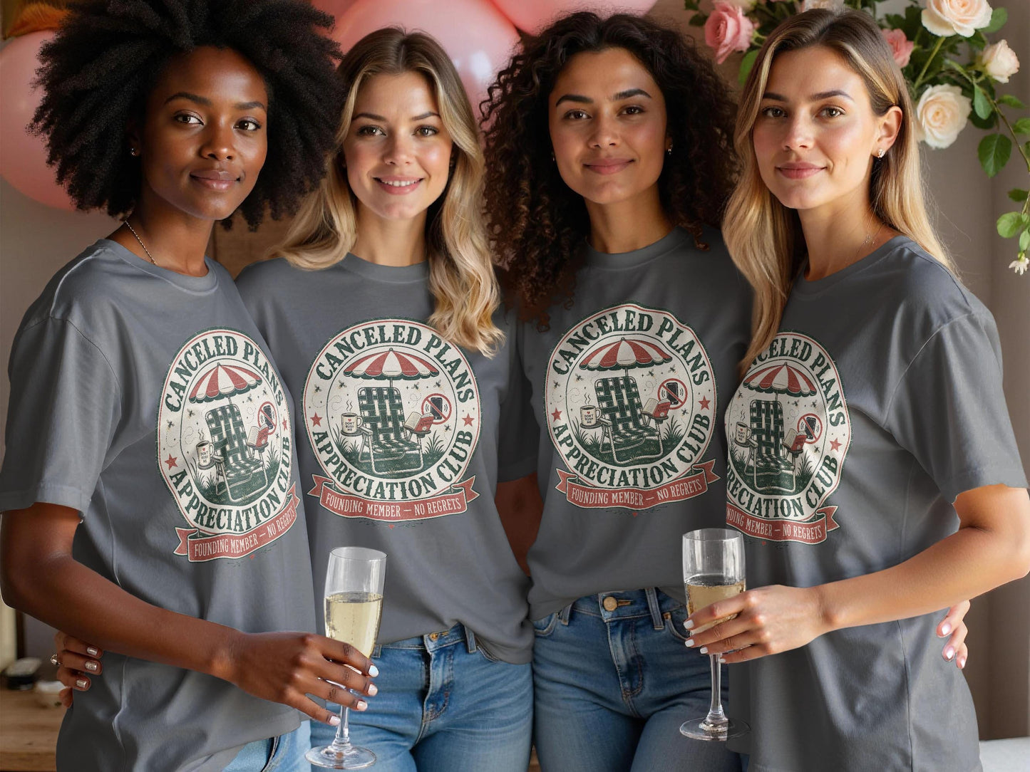 Four women in matching "Canceled Plans Appreciation Club" shirts hold champagne glasses.