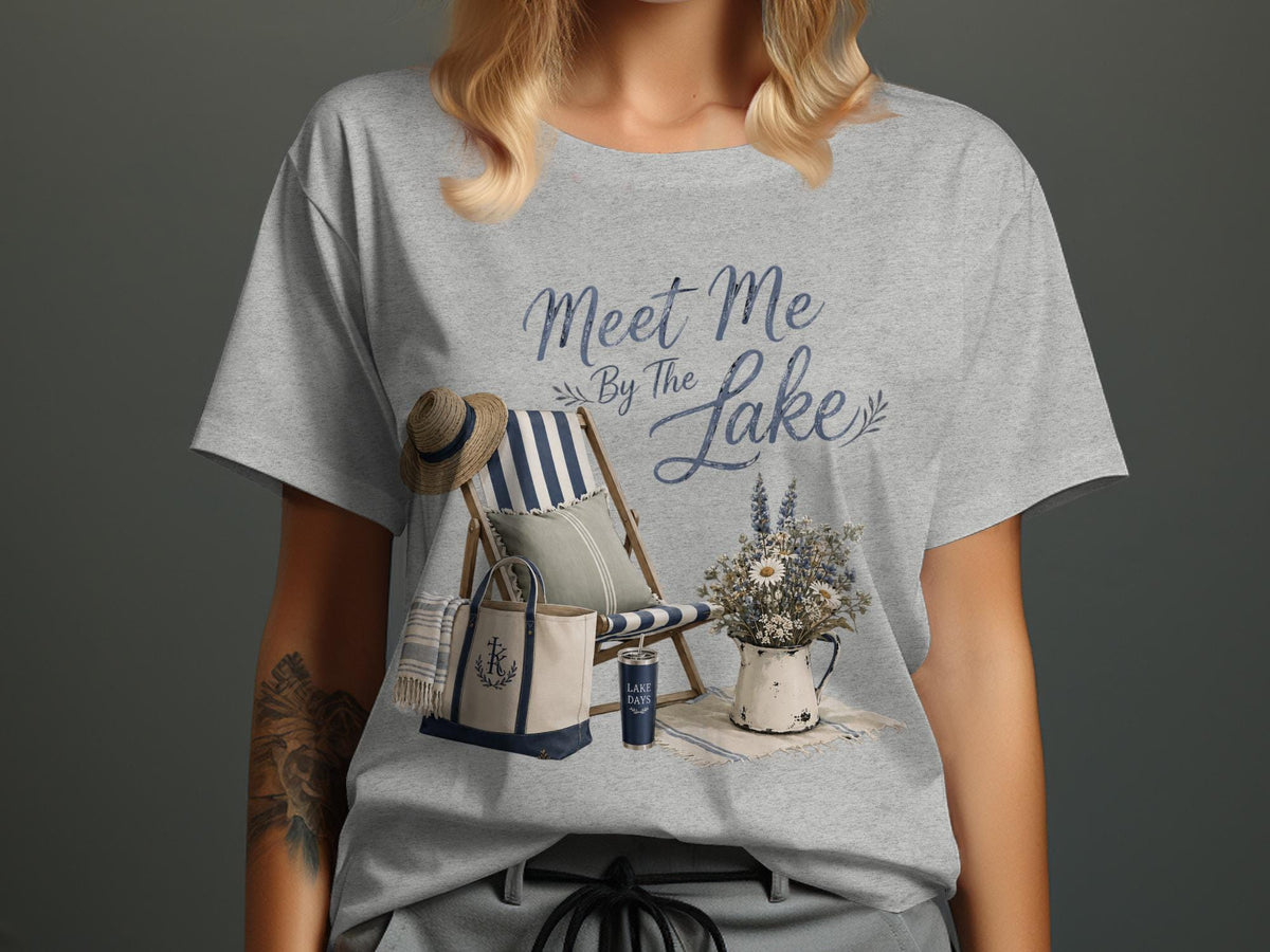 Grey t-shirt with "Meet Me By The Lake" graphic and lake scene.